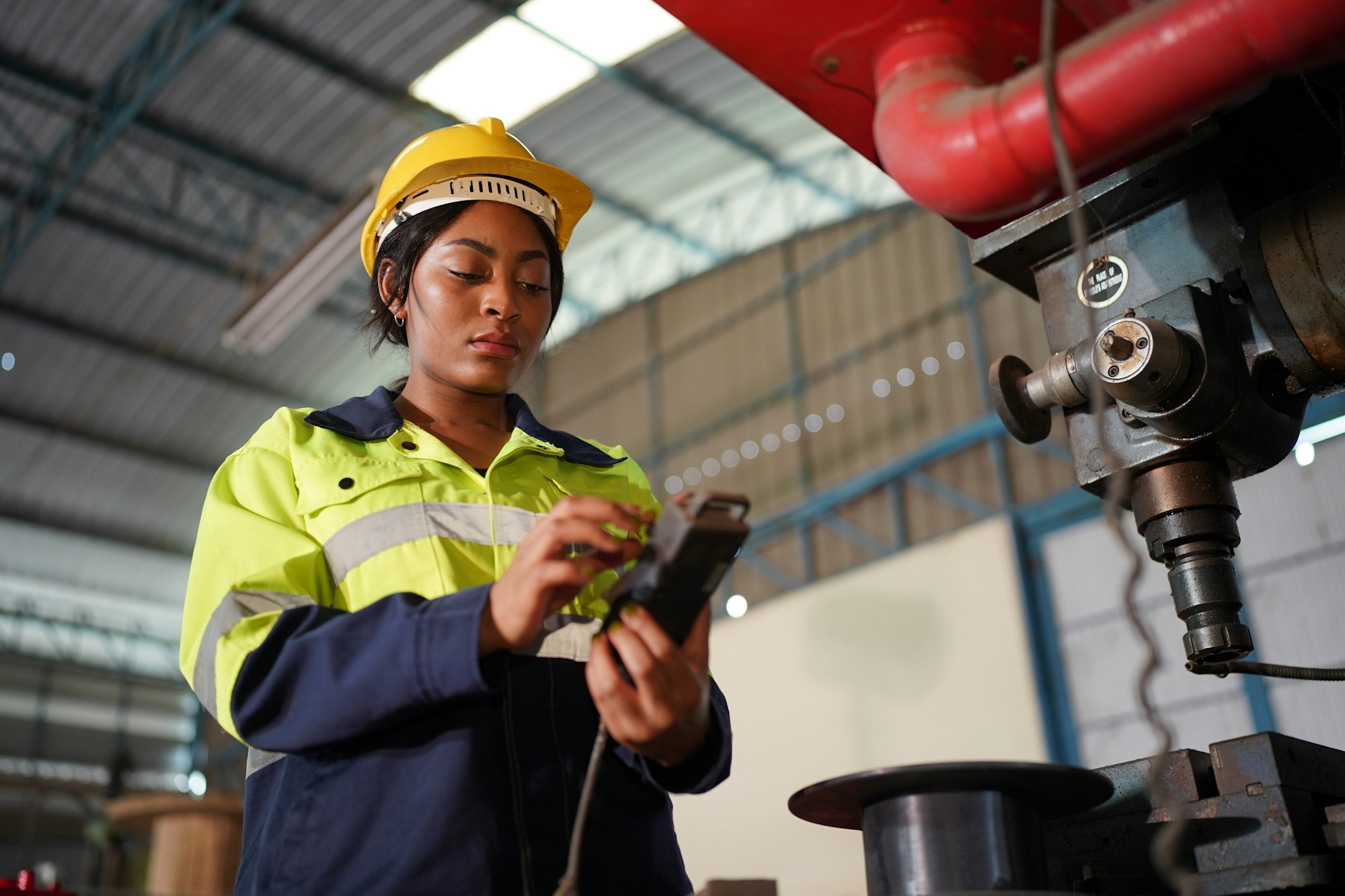 Metal industry worker at factory, Business industry and lathe background.