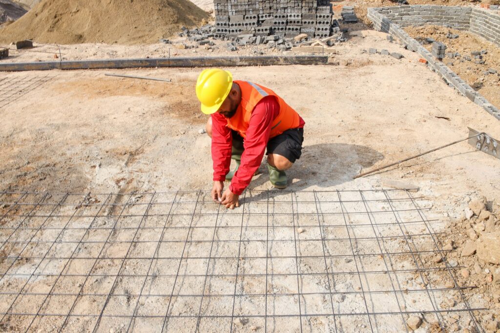 Labor Working at Construction Site